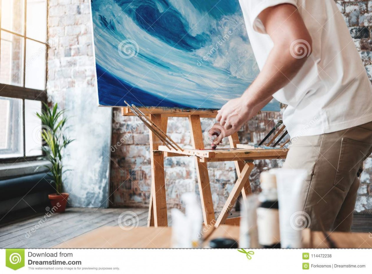 Artist Work In Art Studio Near Easel With Canvas. Painter ..